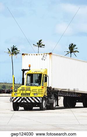 Truck driver driving a semi-truck, Nawiliwili Beach Park, Kauai, Hawaii Islands, USA View Large Photo Image Stock Image - Truck driver driving a semi-truck, Nawiliwili Beach Park, Kauai, Hawaii Islands, USA. Fotosearch