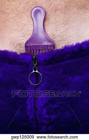 Close-up of a comb inserted in a clothing View Large Photo Image Stock Photo - Close-up of a comb inserted in a clothing. Fotosearch