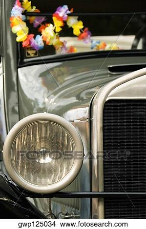 Close-up of a garland on a car View Large Photo Image Picture - Close-up of a garland on a car. Fotosearch
