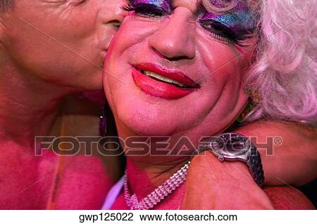 Close-up of a gay man kissing a mature man View Large Photo Image Stock Image - Close-up of a gay man kissing a mature man. Fotosearch