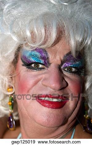 Close-up of a mature gay man smiling View Large Photo Image Stock Photo - Close-up of a mature gay man smiling. Fotosearch