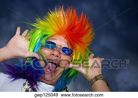 Close-up of a mature man gesturing View Large Photo Image Stock Photo - Close-up of a mature man gesturing. Fotosearch