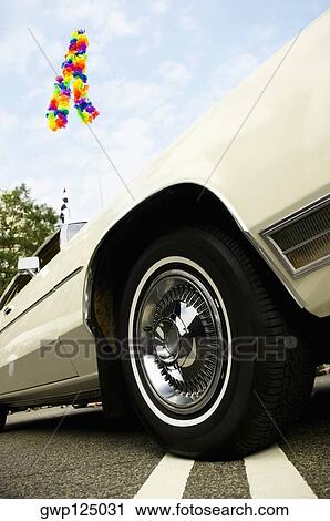 Low angle view of a car View Large Photo Image Stock Image - Low angle view of a car. Fotosearch