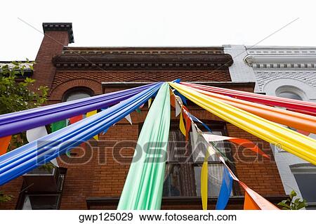 Low angle view of gay pride symbols tied up in front of a building, Dupont Circle, Washington Dc, USA View Large Photo Image Stock Photo - Low angle view of gay pride symbols tied up in front of a building, Dupont Circle, Washington Dc, USA. Fotosearch