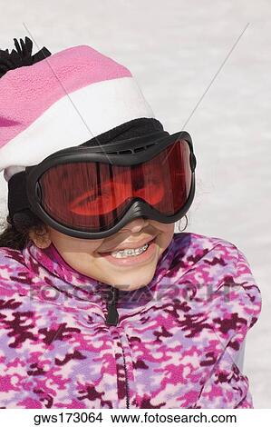 Close-up of a girl smiling View Large Photo Image Picture - Close-up of a girl smiling. Fotosearch