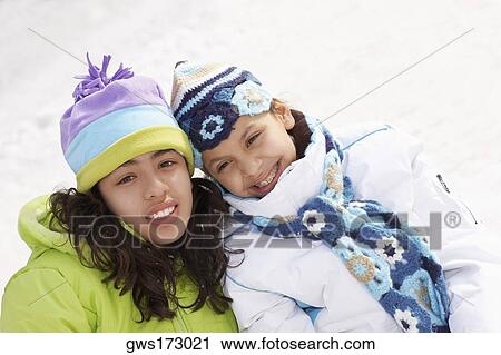 Close-up of two girls smiling View Large Photo Image Stock Image - Close-up of two girls smiling. Fotosearch