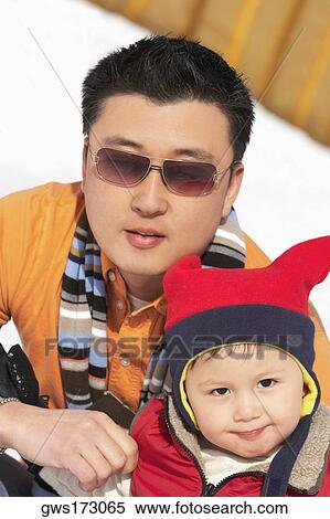 Portrait of a boy with his father View Large Photo Image Stock Photography - Portrait of a boy with his father. Fotosearch