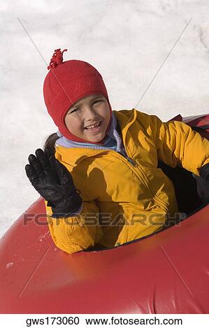 Portrait of a girl sitting on an inner tube View Large Photo Image Stock Image - Portrait of a girl sitting on an inner tube. Fotosearch
