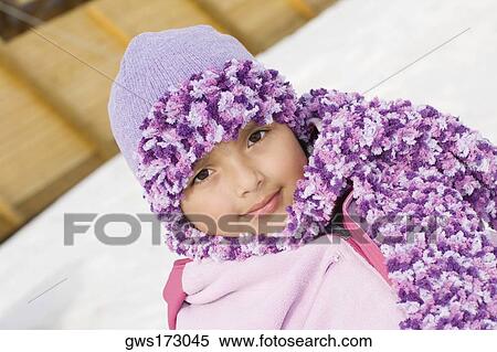 Stock Photography - Portrait of a girl smirking. Fotosearch