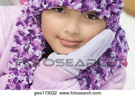 Portrait of a girl with her hand on her chin View Large Photo Image Stock Image - Portrait of a girl with her hand on her chin. Fotosearch