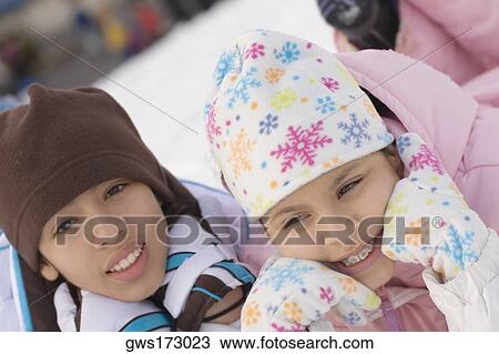 Portrait of two girls smiling View Large Photo Image Stock Image - Portrait of two girls smiling. Fotosearch