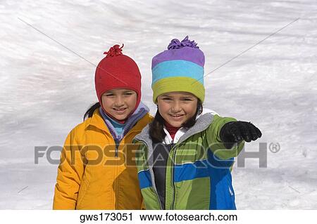 Portrait of two girls smiling View Large Photo Image Stock Image - Portrait of two girls smiling. Fotosearch