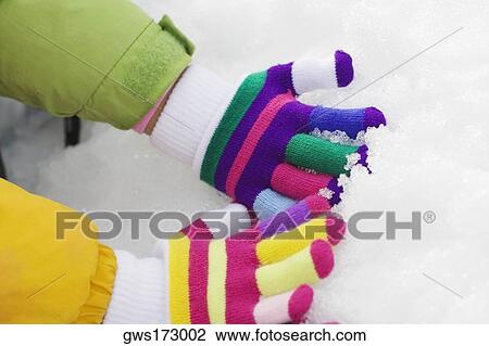 Two people hand's playing with snow View Large Photo Image Stock Image - Two people hand's playing with snow. Fotosearch