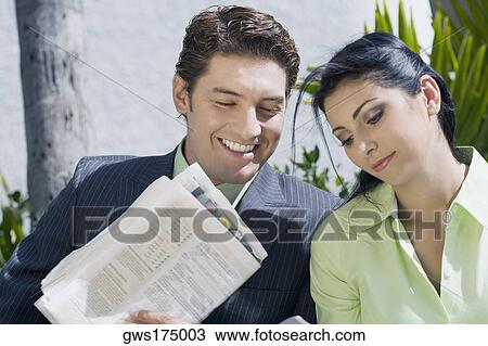 Close-up of a businessman with a businesswoman and smiling View Large Photo Image Stock Image - Close-up of a businessman with a businesswoman and smiling. Fotosearch