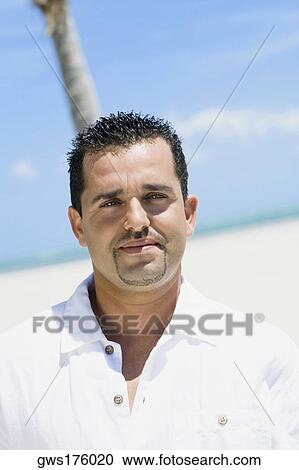 Portrait of a mid adult man smiling View Large Photo Image Stock Image - Portrait of a mid adult man smiling. Fotosearch