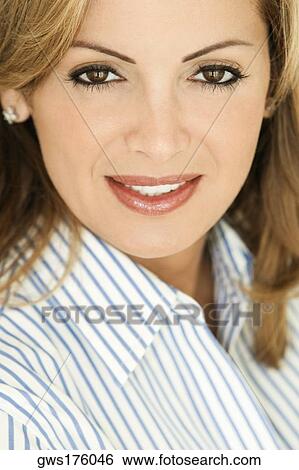 Portrait of a mid adult woman View Large Photo Image Stock Photograph - Portrait of a mid adult woman. Fotosearch