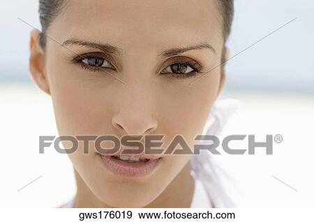 Portrait of a young woman View Large Photo Image Stock Photo - Portrait of a young woman. Fotosearch