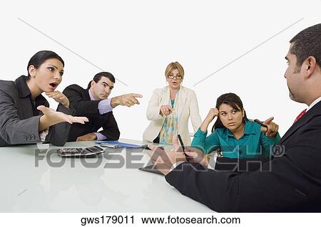 Three businesswomen and a businessman blaming another businessman View Large Photo Image Stock Image - Three businesswomen and a businessman blaming another businessman. Fotosearch