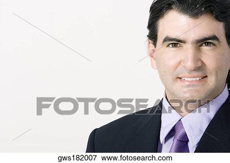 Stock Photo - Portrait of a businessman smiling. Fotosearch