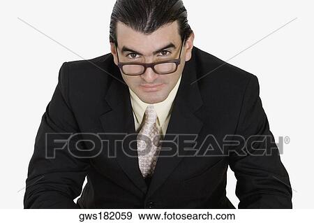 Portrait of a businessman wearing eyeglasses View Large Photo Image Stock Photo - Portrait of a businessman wearing eyeglasses. Fotosearch