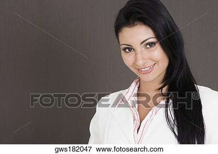 Stock Photo - Portrait of a businesswoman smiling. Fotosearch