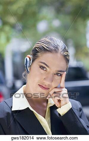 Portrait of a businesswoman thinking View Large Photo Image Picture - Portrait of a businesswoman thinking. Fotosearch