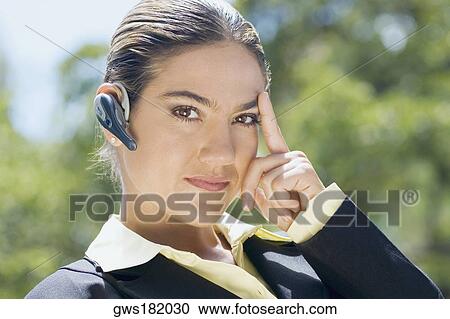Portrait of a businesswoman thinking View Large Photo Image Stock Image - Portrait of a businesswoman thinking. Fotosearch