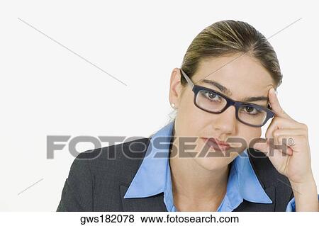 Portrait of a businesswoman thinking View Large Photo Image Stock Photo - Portrait of a businesswoman thinking. Fotosearch
