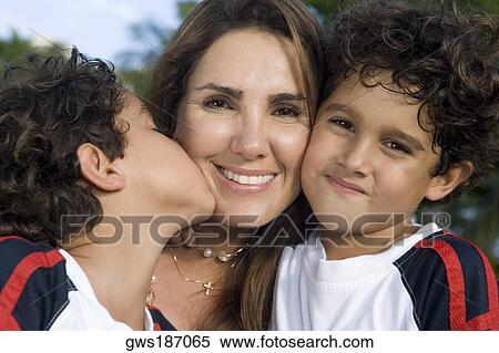Close-up of a mid adult woman with her two sons View Large Photo Image Stock Photography - Close-up of a mid adult woman with her two sons. Fotosearch