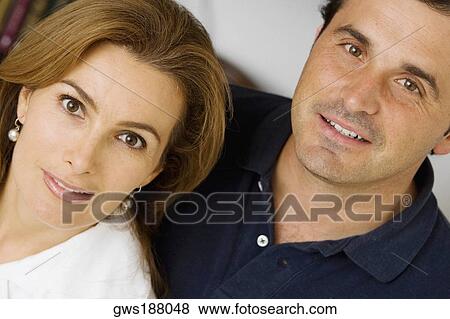 Portrait of a mature couple smiling View Large Photo Image Stock Photo - Portrait of a mature couple smiling. Fotosearch