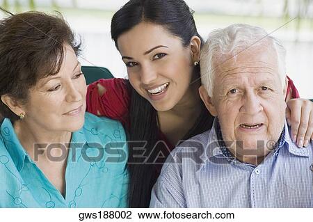 Portrait of a senior couple with their granddaughter View Large Photo Image Stock Image - Portrait of a senior couple with their granddaughter. Fotosearch