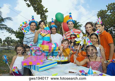 Group of people celebrating a birthday party View Large Photo Image Stock Photo - Group of people celebrating a birthday party. Fotosearch
