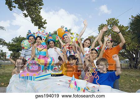Group of people celebrating a birthday party View Large Photo Image Stock Photo - Group of people celebrating a birthday party. Fotosearch