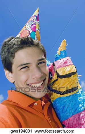 Portrait of a boy smiling with a rocking horse View Large Photo Image Stock Image - Portrait of a boy smiling with a rocking horse. Fotosearch