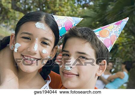 Picture - Portrait of a boy with his arm around a girl. Fotosearch