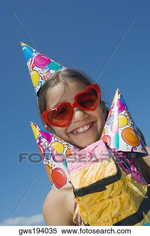 Portrait of a girl sitting on a rocking horse and smiling View Large Photo Image Stock Photography - Portrait of a girl sitting on a rocking horse and smiling. Fotosearch