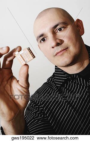 Close-up of an architect holding an architectural model of a building View Large Photo Image Stock Image - Close-up of an architect holding an architectural model of a building. Fotosearch