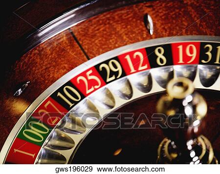 Stock Photo - Close-up of a roulette wheel in a casino. Fotosearch