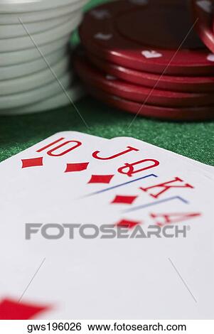 Close-up of the poker of diamonds with stacks of gambling chips on a gambling table View Large Photo Image Stock Photograph - Close-up of the poker of diamonds with stacks of gambling chips on a gambling table. Fotosearch