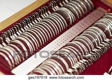 Stock Photo - Close-up of a box of optical lenses. Fotosearch