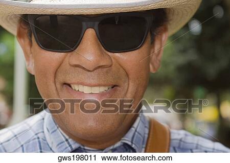 Stock Image - Close-up of a mature man smiling. Fotosearch