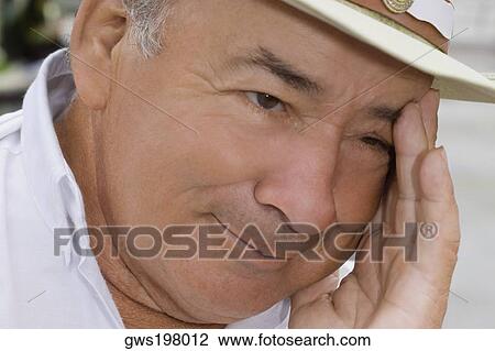 Stock Image - Close-up of a mature man smiling. Fotosearch