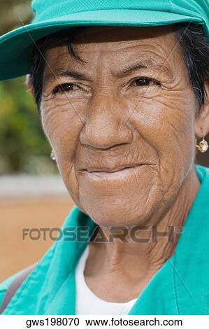 Close-up of a mature woman smiling View Large Photo Image Stock Image - Close-up of a mature woman smiling. Fotosearch