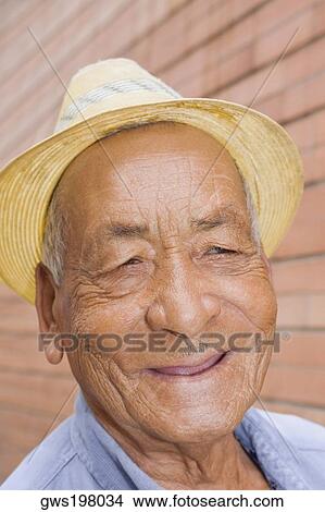 Close-up of a senior man smiling View Large Photo Image Picture - Close-up of a senior man smiling. Fotosearch