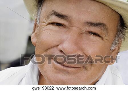 Portrait of a mature man smiling View Large Photo Image Stock Image - Portrait of a mature man smiling. Fotosearch