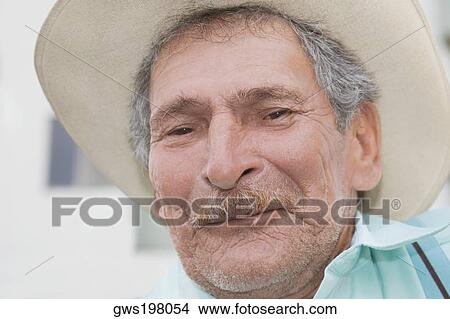 Portrait of a senior man smiling View Large Photo Image Picture - Portrait of a senior man smiling. Fotosearch
