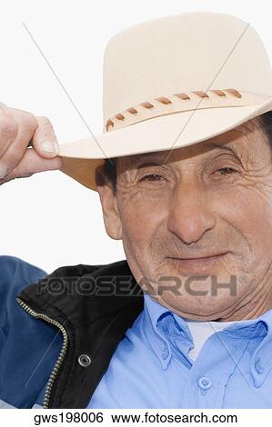 Portrait of a senior man wearing a hat and smiling View Large Photo Image Stock Photograph - Portrait of a senior man wearing a hat and smiling. Fotosearch