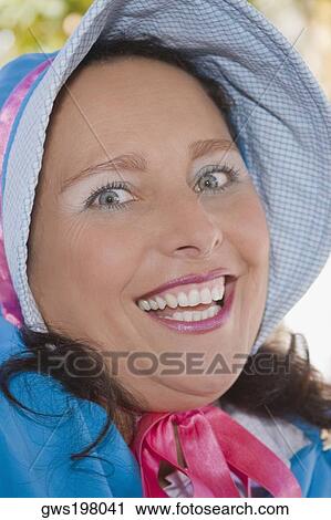 Portrait of a young woman smiling View Large Photo Image Stock Image - Portrait of a young woman smiling. Fotosearch