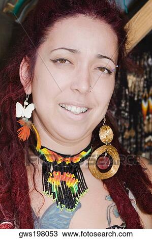 Portrait of a young woman smiling View Large Photo Image Stock Image - Portrait of a young woman smiling. Fotosearch