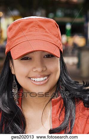 Portrait of a mid adult woman smiling View Large Photo Image Stock Image - Portrait of a mid adult woman smiling. Fotosearch